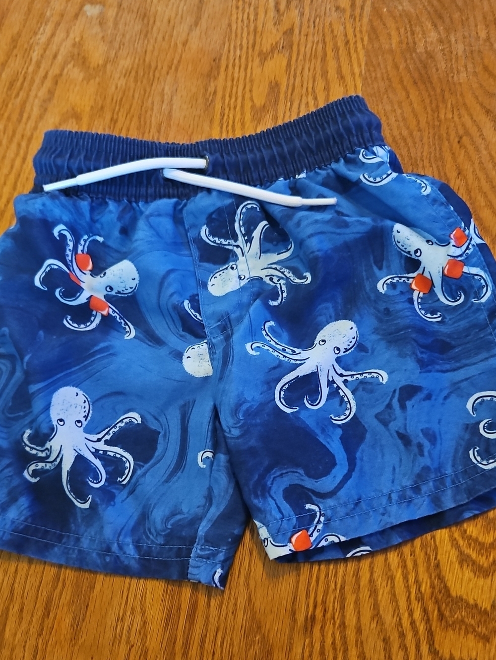 Carter's Blue Swim Trunks with White Octopus Print and Orange Accents